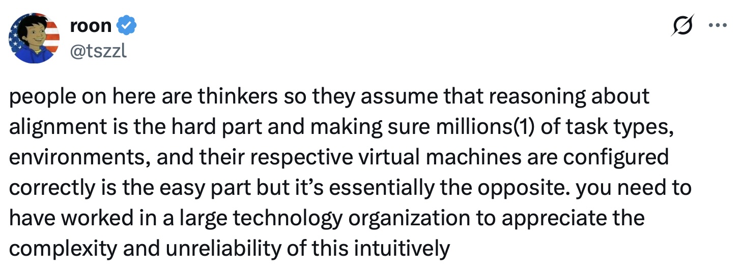Screenshot of a tweet from the verified account roon (@tszzl), whose avatar is a cartoon figure against an American flag, arguing that people online assume reasoning about alignment is the hard part and configuring millions of task types, environments, and their virtual machines is the easy part, when it is essentially the opposite — and that you need to have worked in a large technology organization to appreciate the complexity and unreliability intuitively.